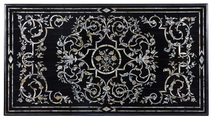 An important late baroque Venetian ebony mother of pearl and metal inlaid table top